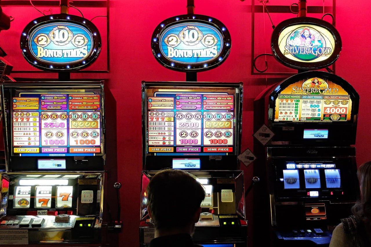 Starburst slot game interface on ojoltogel login platform showing colourful gem symbols and reel layout